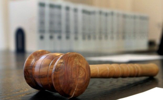 Verletzung beim Anheben einer Leiche gilt als Arbeitsunfall