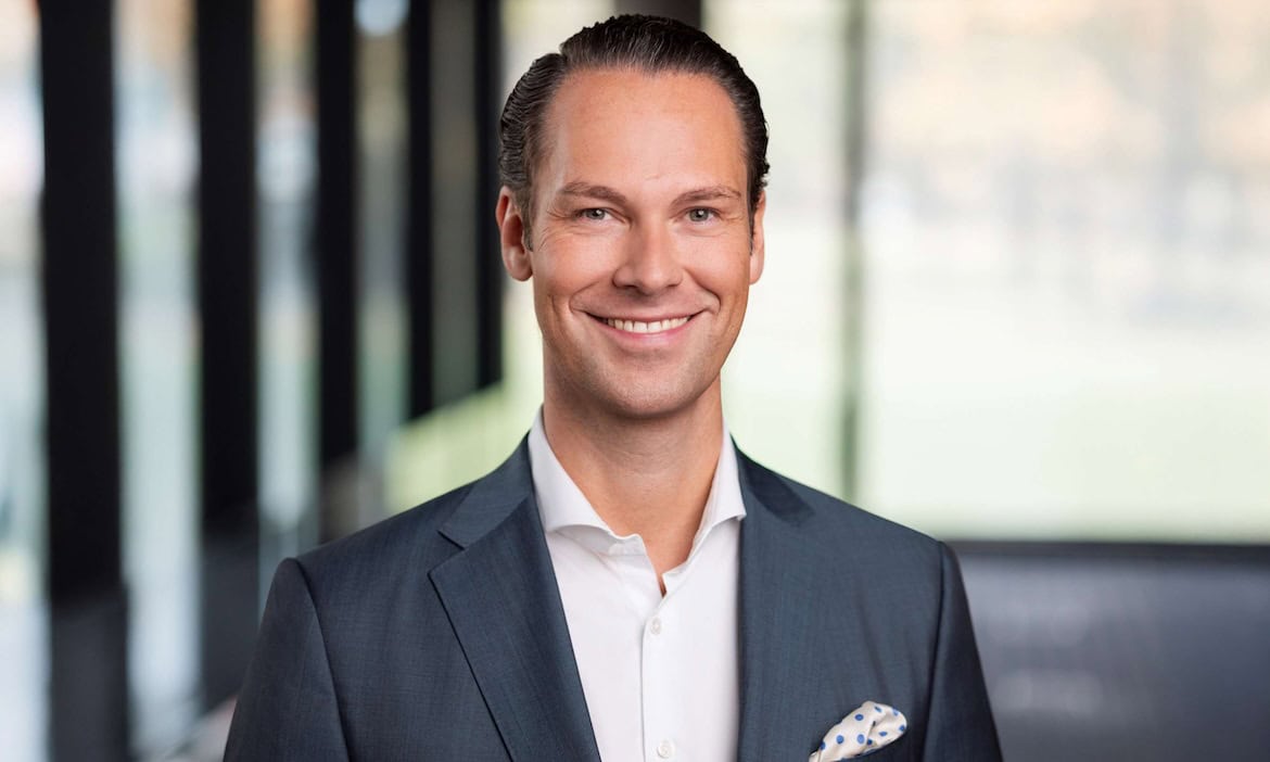 Christian Pape, Vorstand Vertrieb und Marketing, bei der ALH Gruppe, in einem professionellen Busine.